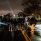 Demonstrators confront law enforcement outside the Brooklyn Center police headquarters on April 12, 2021 in Brooklyn Center, Minnesota. People have taken to the streets to protest after Daunte Wright, a 20-year-old Black man, was shot and killed by Brooklyn Center police officer Kimberly Potter during a traffic stop .
